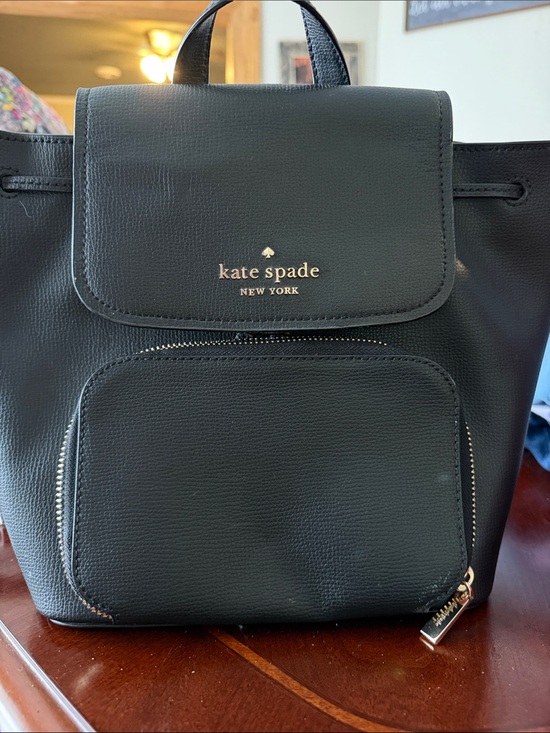 black leather kate spade backpack new york kate spade kate spade K7779 001 This style has a 100% recycled nylon shell on the outside and 100% recycled polyester lining (and love) on the inside. Kate Spade Darcy Flap Backpack